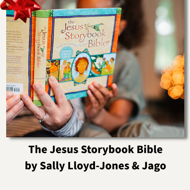 A person holds 'The Jesus Storybook Bible' in both hands, with another copy shown open behind it. A large red bow graphic appears in the top-left corner, and the title text 'The Jesus Storybook Bible by Sally Lloyd-Jones & Jago' is printed below the photo on a light gray background.