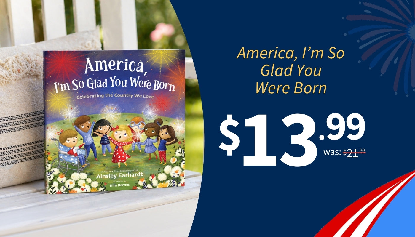Children's book titled 'America, I'm So Glad You Were Born' with a price tag on a blue background with the copy America, I'm So Glad You Were Born $13.99 was $21.99