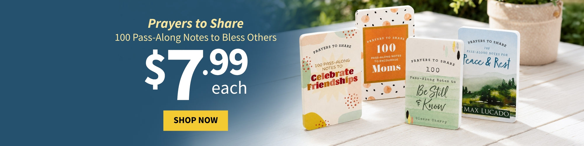 Set of prayer books with a promotional banner for $7.99 each on a table outdoors.