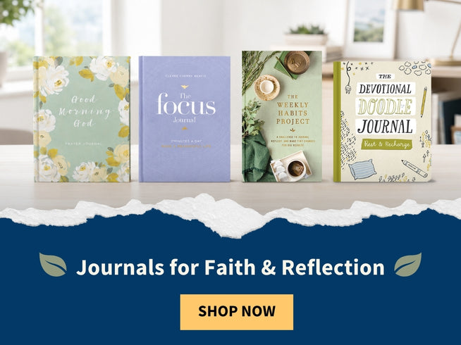 Four boxed journals displayed side by side on a tabletop with a torn-paper style graphic and a blue promotional banner below reading 'Journals for Faith & Reflection' and 'SHOP NOW.' The journals have floral and neutral covers, including titles such as Good Karma God, Focus, The Weekly Habits Project, and The Devotional Doodle Journal.
