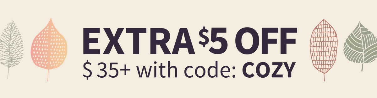 Promotional banner with the text 'EXTRA $5 OFF $35+ with code: COZY' in dark purple on a warm beige background, decorated with stylized leaf illustrations in peach, rust, and sage green.