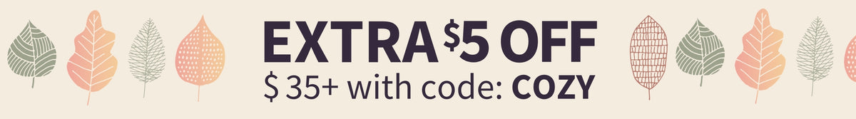 Promotional banner with the text 'EXTRA $5 OFF $35+ with code: COZY' in dark gray on a warm beige background, decorated with stylized leaf icons in muted green, peach, and orange.