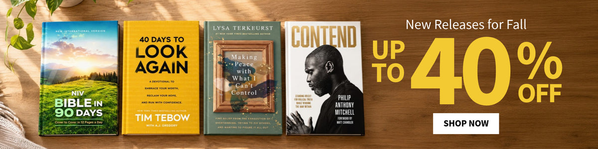A promotional banner showing four book covers on a wooden surface with large sale text reading 'New Releases for Fall,' 'UP TO 40% OFF,' and a 'SHOP NOW' button. Visible books include 'My Bible in 90 Days' by Tim Tebow, '40 Days to Look Again' by Tim Tebow, 'The Power of What You Want' by Lisa Terrey, and 'Contend' by Philip Graham.