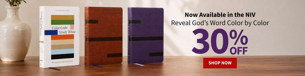 Three colored Codex Bibles standing on a wooden table next to a ceramic vase, with promotional text on the right reading 'Now Available in the NIV Reveal God's Word Color by Color' and a large '30% OFF' with a red 'SHOP NOW' button.